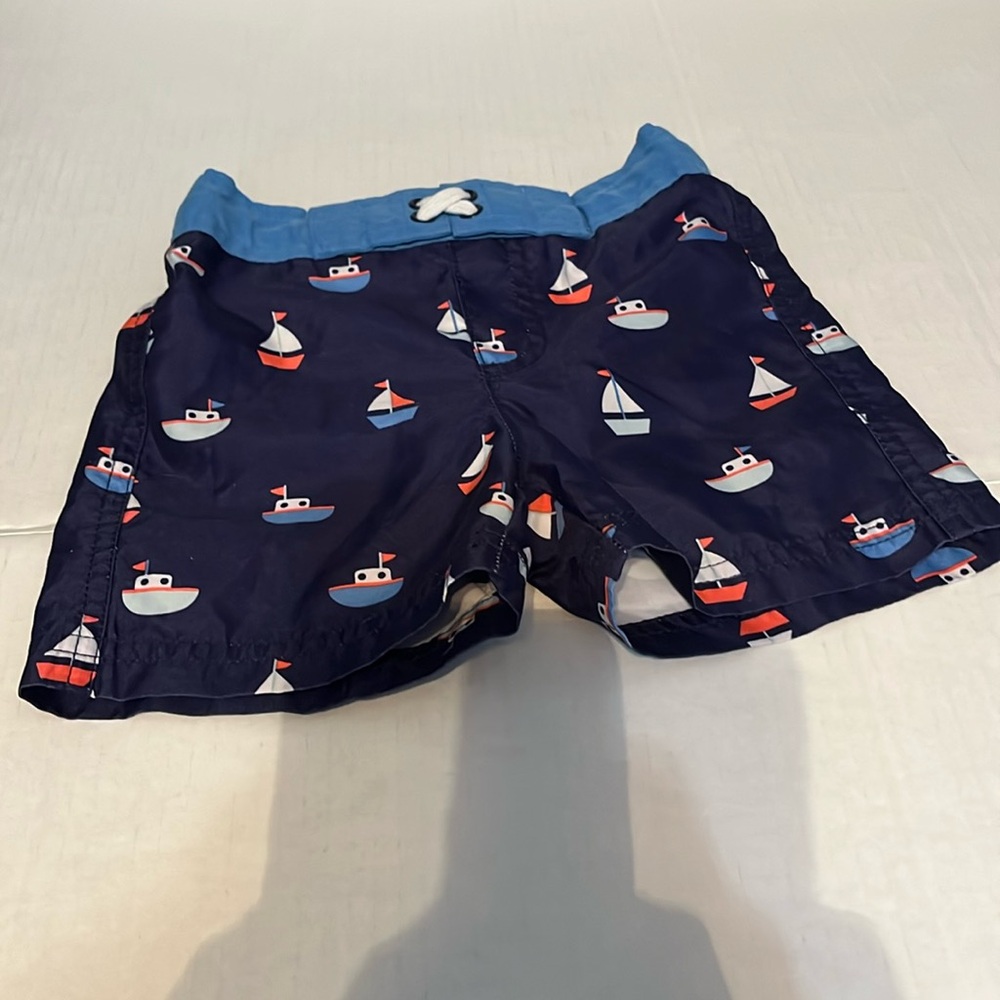Cat & Jack size 18 months blue swimming shorts. W/ sailboats on them. NWOT